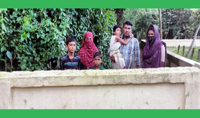 বাড়ি থেকে বাহির হওয়ার  রাস্তাটি দেয়াল দিয়ে ঘিরে রাখা
